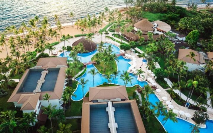 Main infinity pool and palm trees at Dreams Onyx Resort & Spa Punta Cana