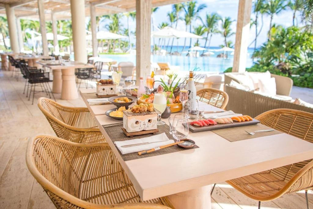 Oceanfront La Palapa restaurant over the water at Eden Roc Cap Cana