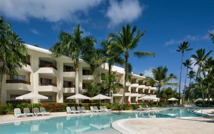 Iconic wooden overwater pier on Bavaro Beach at Impressive Premium Punta Cana