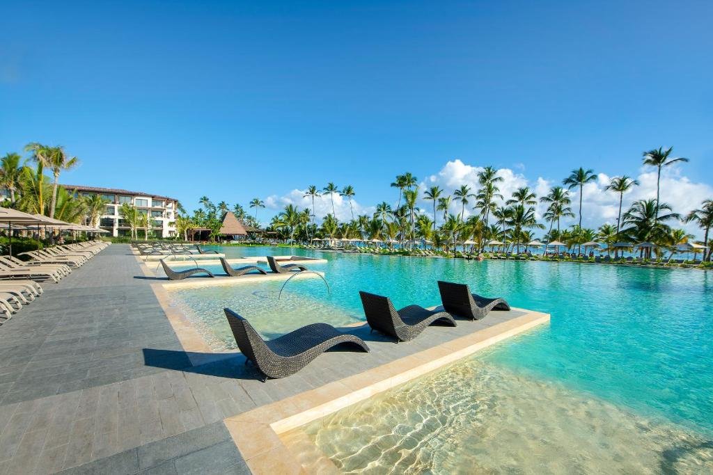 Contemporary junior suite and balcony at Lopesan Costa Bavaro Resort